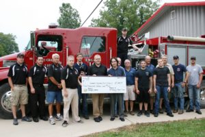 Emmet-Chalmers Fire Protection District accepts a $5,000 Operation Round-Up grant for the purchase of a FLIR Thermal Imaging Camera. The new camera is a vital tool that helps firefighters quickly visualize their plan of attack, locate hot spots, and save lives.