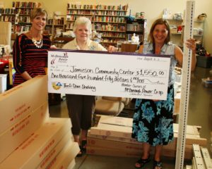 Jamieson Community Center Executive Director Nancy Mowen accepts an Operation Round-Up grant for the purchase of shelving for their Thrift Store. Pictured L-R: Kelly Hamm of McDonough Power, June Friend Operation Round-Up Trustee and Nancy Mowen.